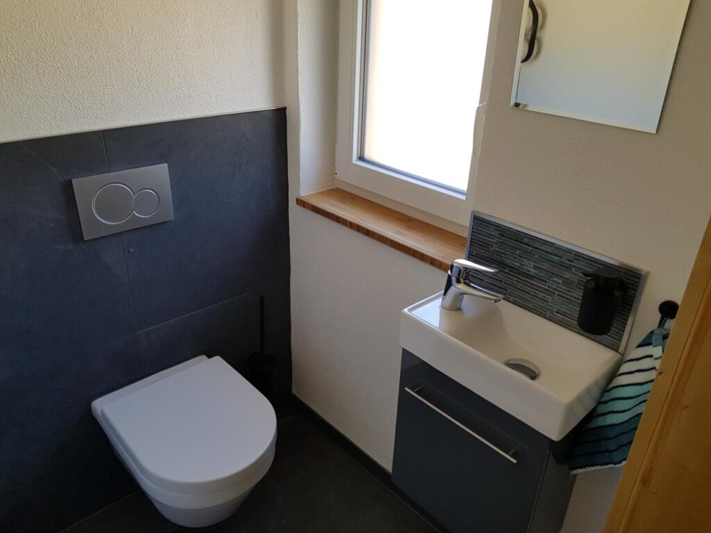 Bild der Toilette in der Ferienwohnung Grand Family im Obergeschoss